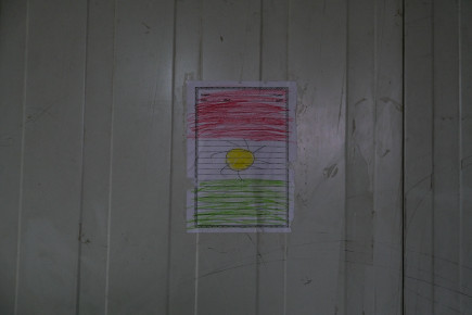 A drawing of a Kurdish flag at Basrma camp in northern Iraq. 